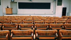 Empty auditorium chairs in a lecture hall