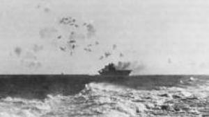 A black and gray picture of a World War 2 battleship